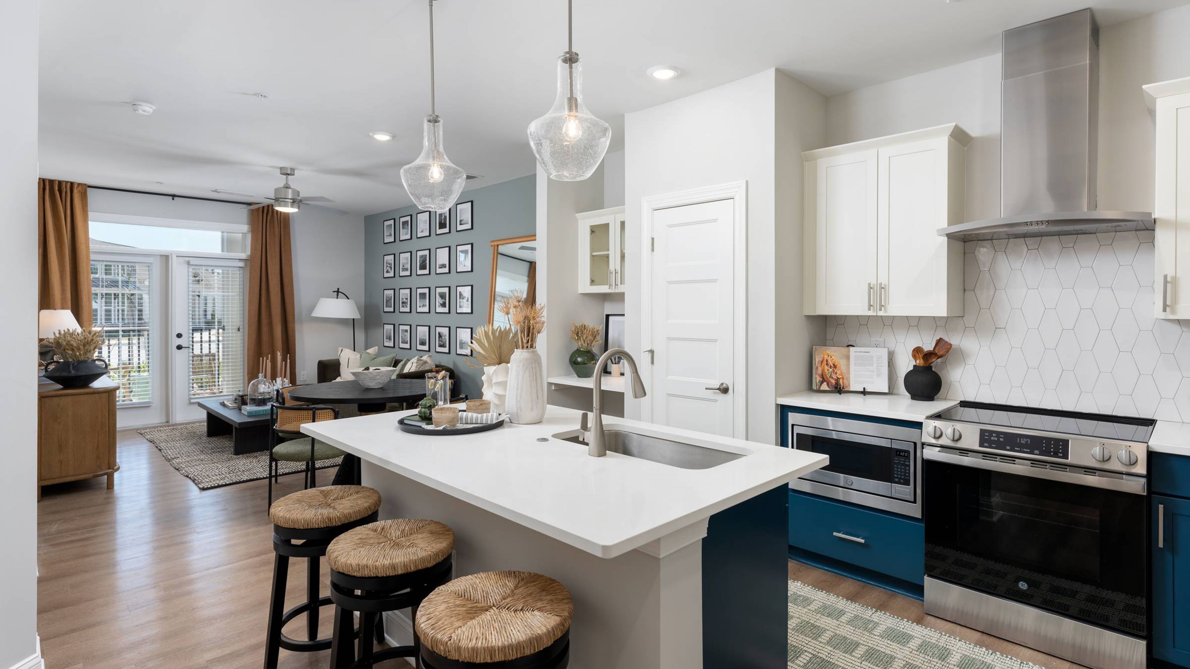 Hawthorne at Hampstead apartment interior showing living and dining area with large windows